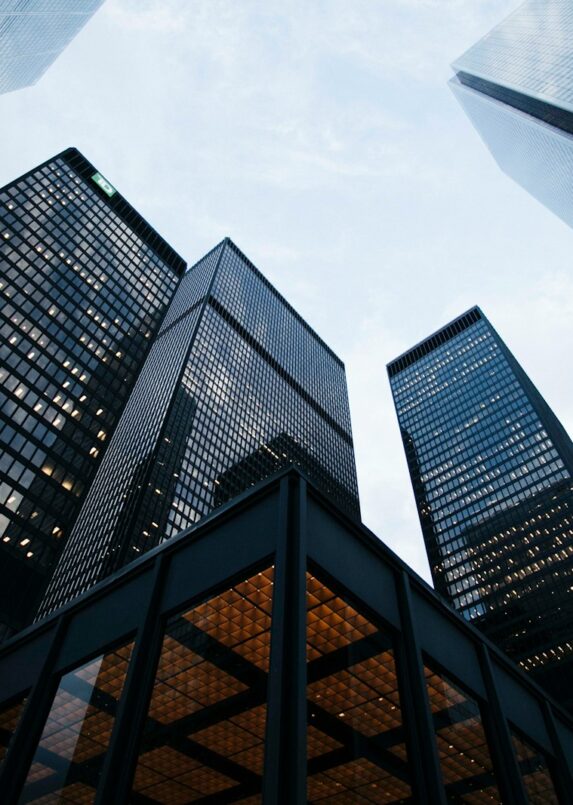 low angle photo of city high rise buildings during daytime