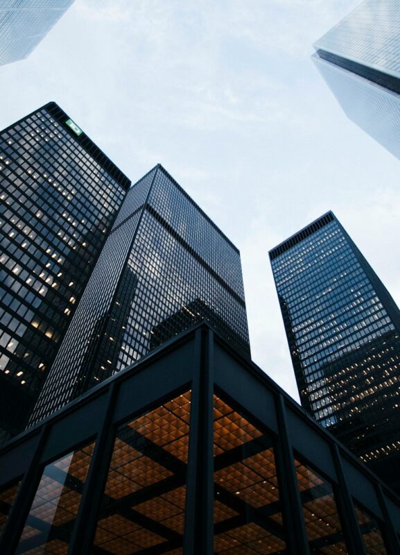 Photo by Sean Pollock low angle photo of city high rise buildings during daytime